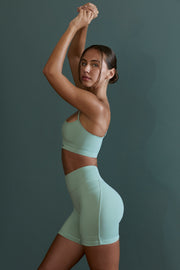 Enhance - Asymmetric Neckline Sports Bra in Sage