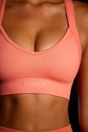 Purpose - Super Sculpt Seamless Cross Back Sports Bra in Coral Orange