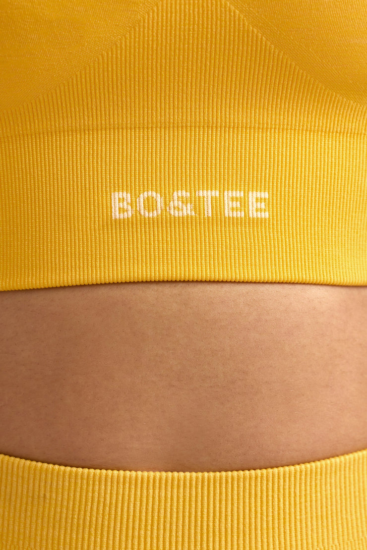 Define Luxe Halterneck Sports Bra in Golden Yellow