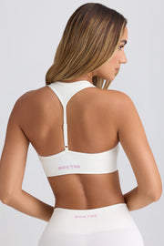 Super Sculpt Seamless T-Back Sports Bra in Eggshell